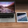 three apple products sitting on a table