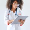 nurse working on a mobile tablet