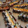 college students studying in a library